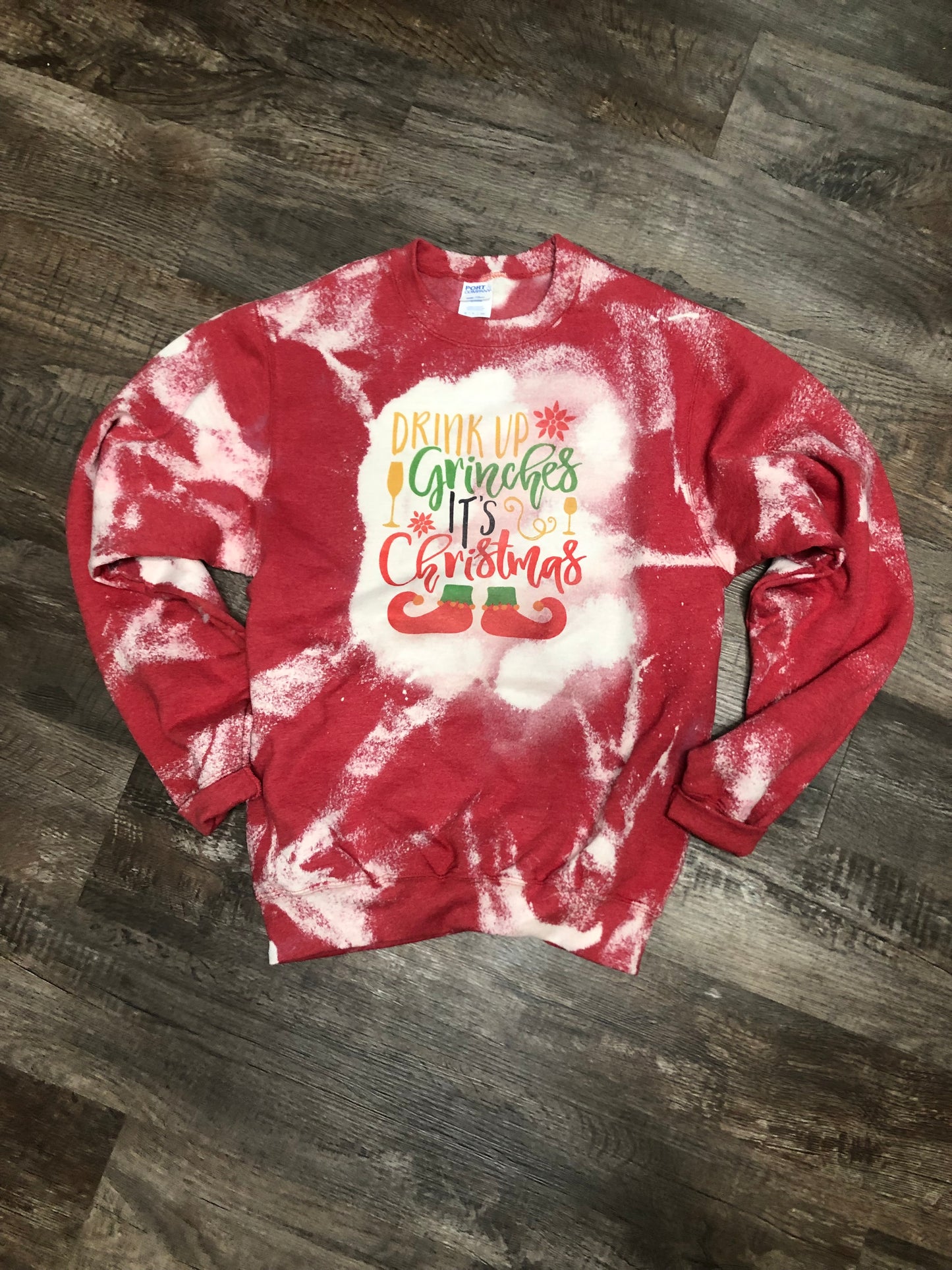 Drink up Ginches it’s Christmas on a red bleached sweatshirt