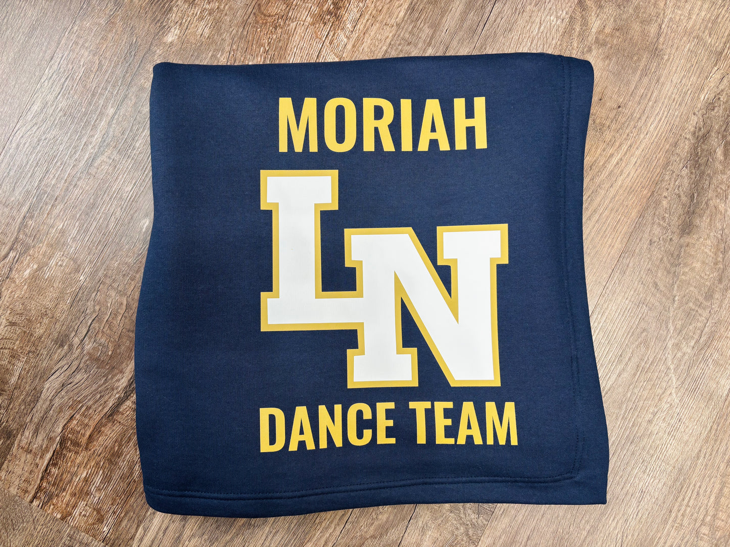 Dance Team Blanket. Custom sports team blanket by Liv's Boutique, personalized team gift, soft fabric with team name and logo details visible.