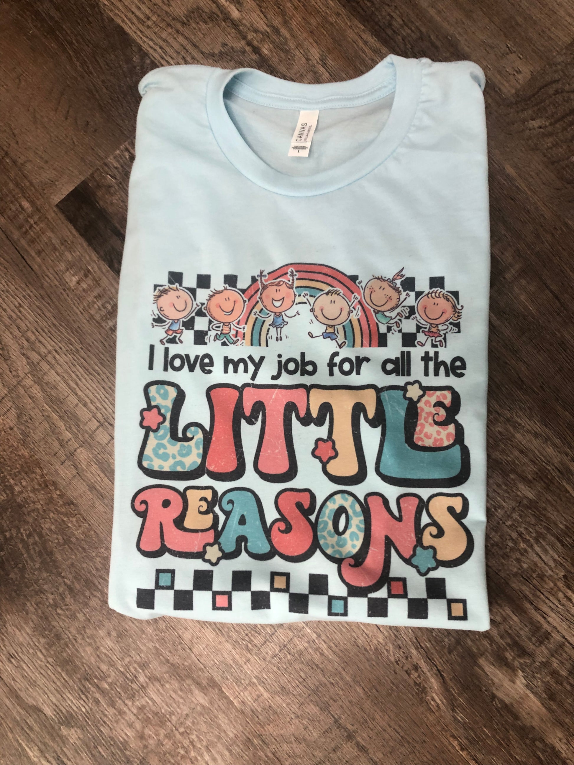 i love my job for all the little reasons teacher tee in blue