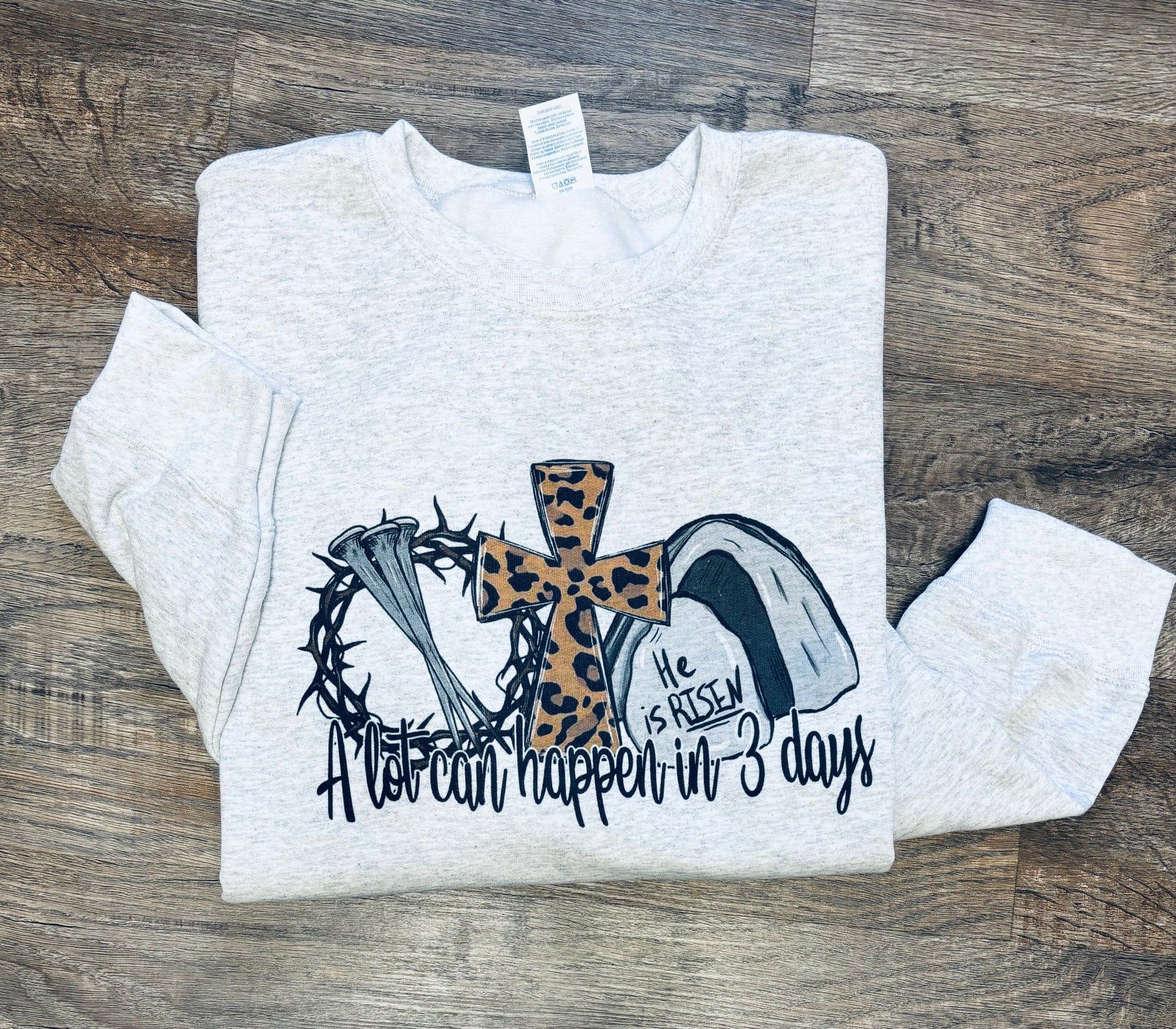 A lot can happen in three days, he is risen, the stone has rolled away Christian Sweatshirt