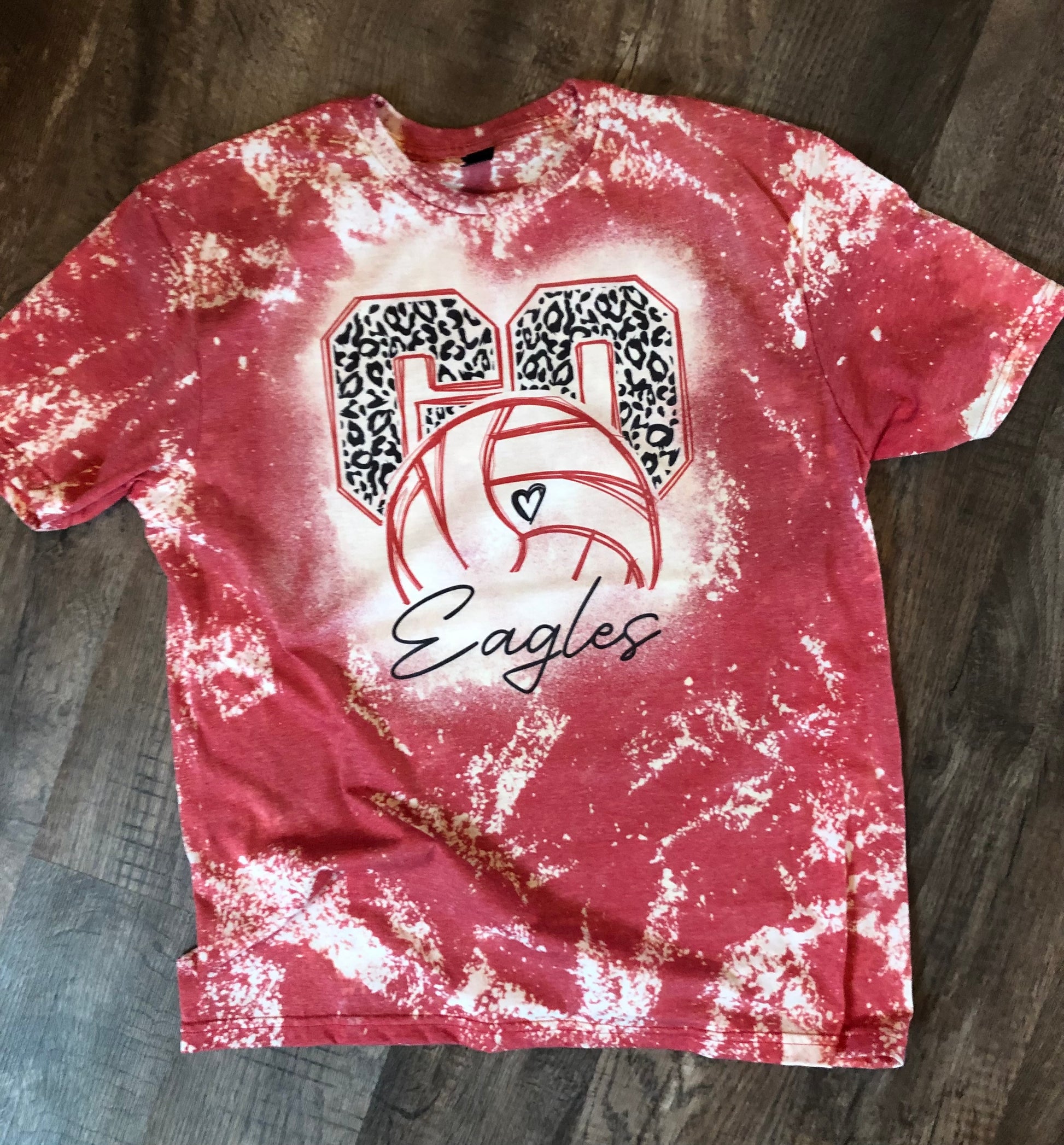 Custom bleached volleyball mom shirt with player name and number along with tea name 