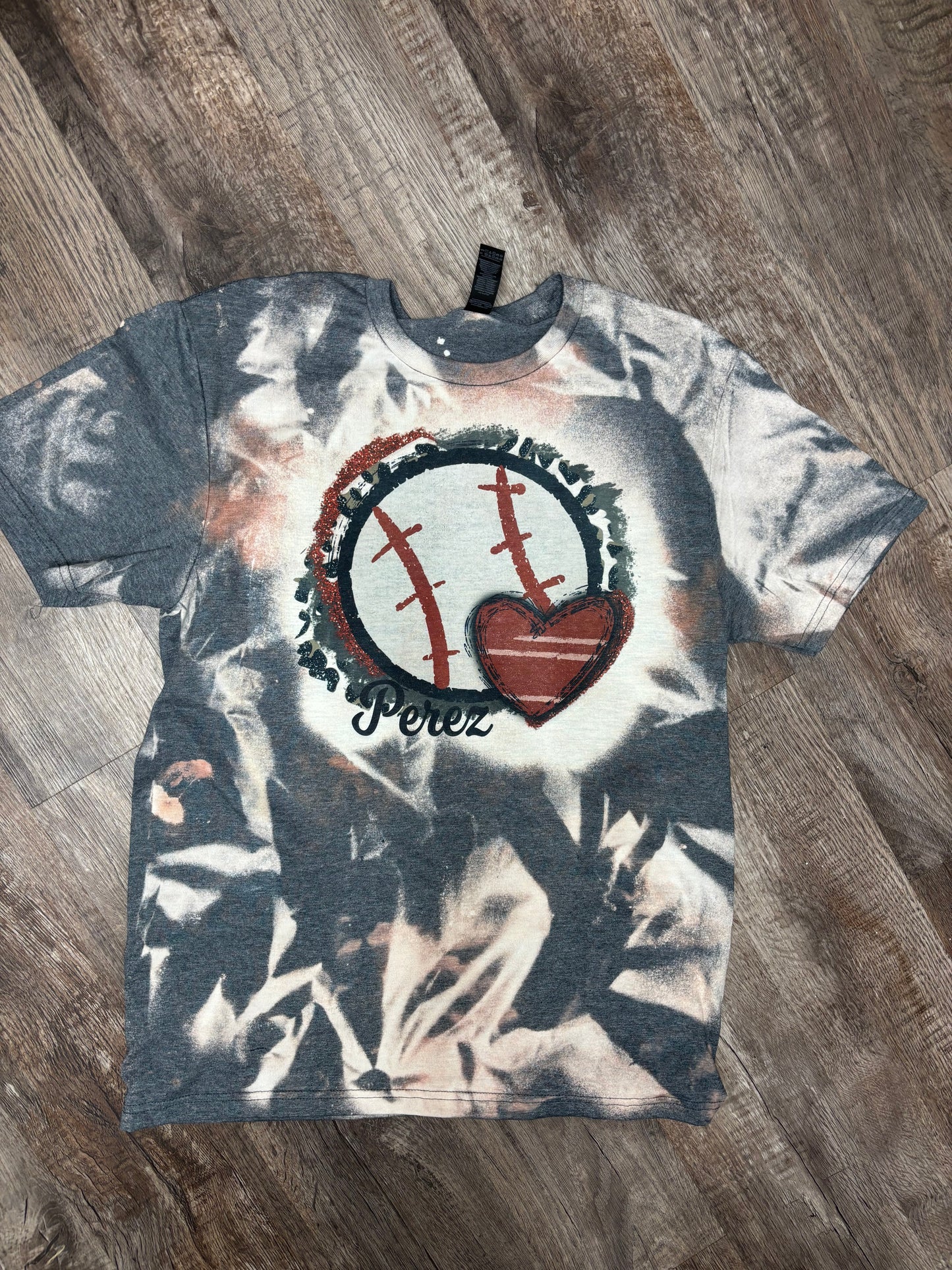 Custom bleached baseball mom T-shirt from Liv's Boutique featuring team name and number on front, casual and stylish design.