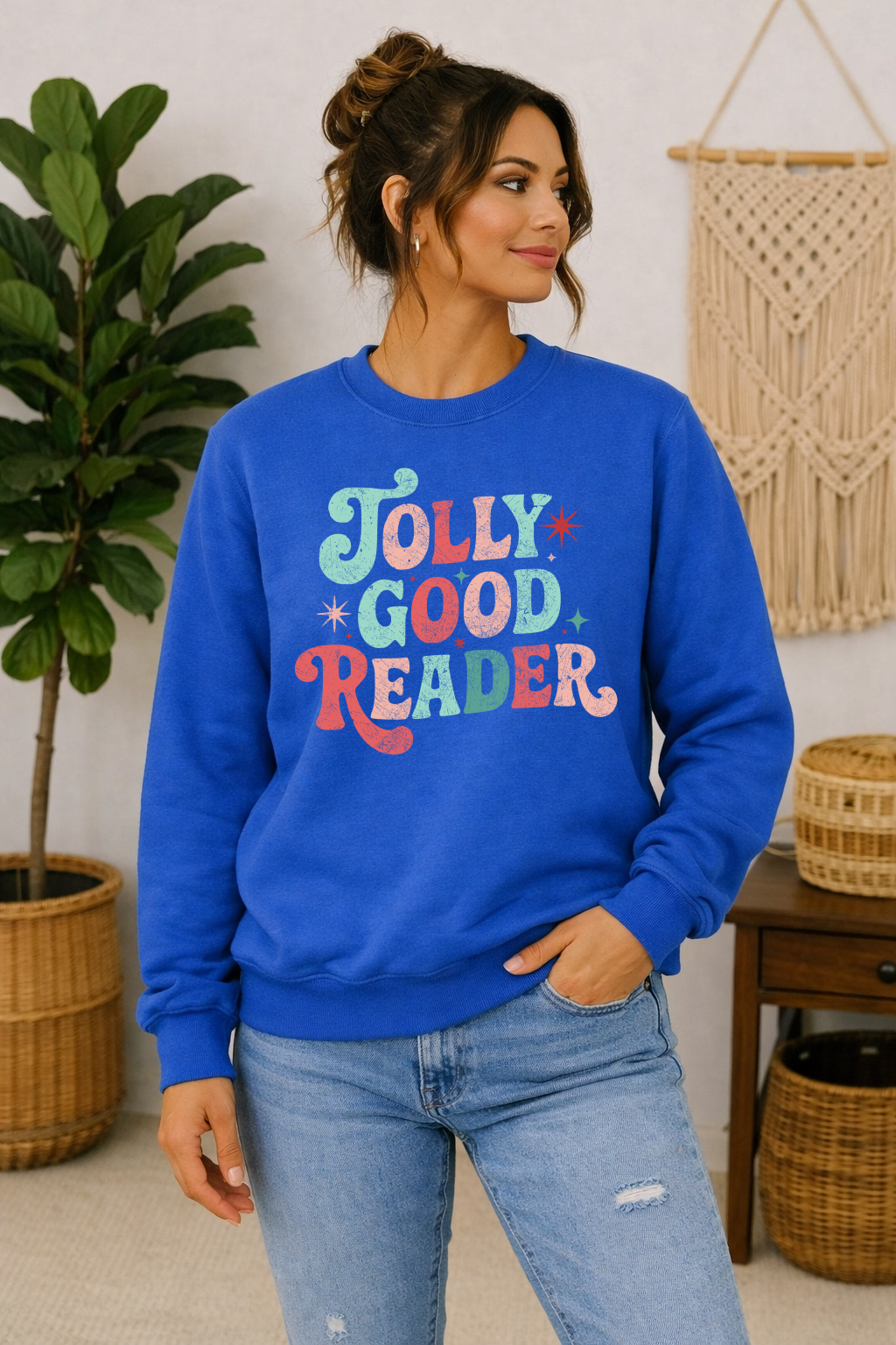 Jolly good reader vintage Christmas theme sweatshirt on a blue crewneck