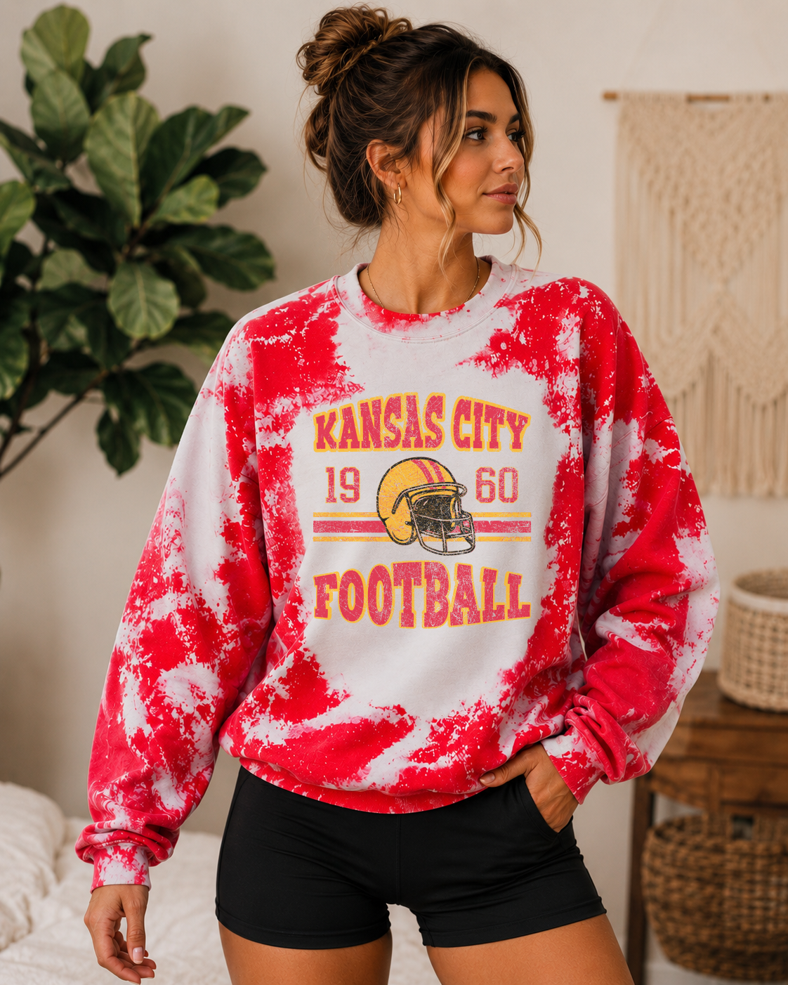 Kansas bleached football sweatshirt featuring distressed Chiefs logo from Liv's Boutique, casual sportswear with a vintage look.