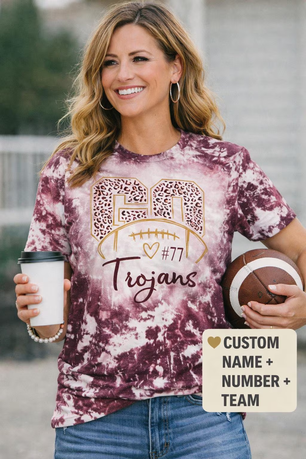 Custom bleached football spirit T-shirt from Liv's Boutique featuring personalized leopard school design and sporty details.